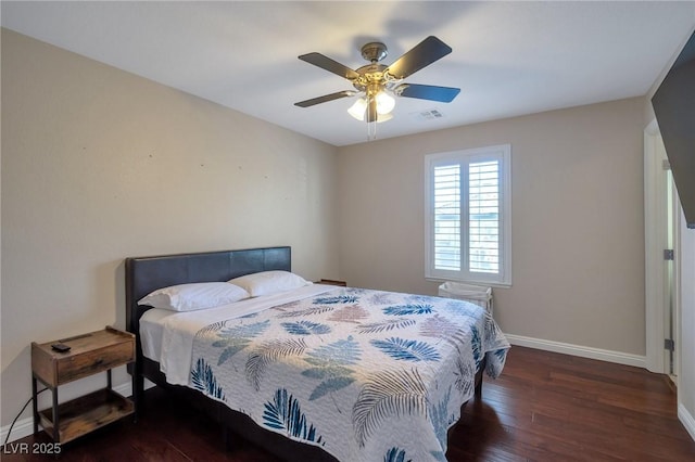7520 Fontera Ct, Las Vegas, NV 89139 - bedroom featuring baseboards, wood finished floors, and a ceiling fan