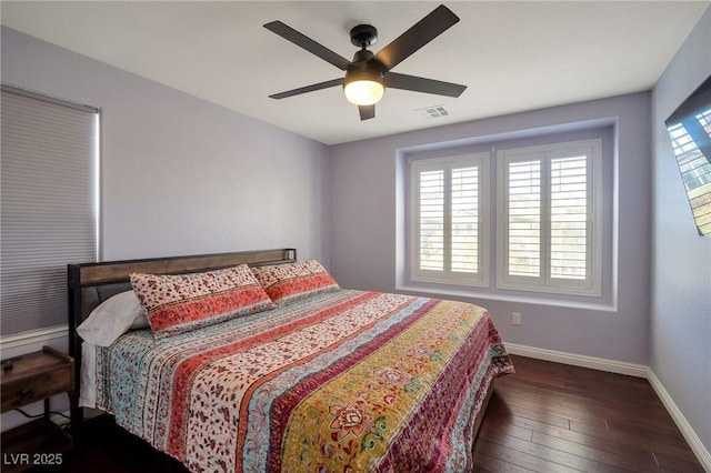7520 Fontera Ct, Las Vegas, NV 89139 - bedroom featuring baseboards, wood-type flooring, and ceiling fan
