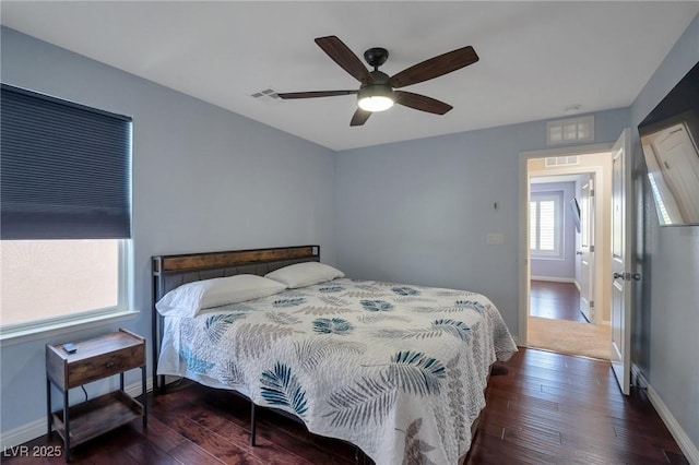 7520 Fontera Ct, Las Vegas, NV 89139 - bedroom featuring wood finished floors, baseboards, and a ceiling fan