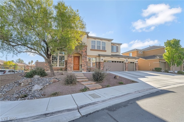 7778 Villa Montara St, Las Vegas, NV 89123 - view of front of home featuring concrete driveway, fence, stone siding, stucco siding, and an attached garage
