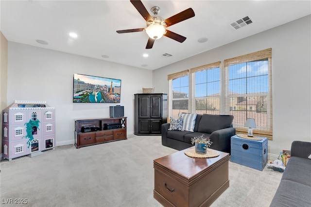 7778 Villa Montara St, Las Vegas, NV 89123 - living room featuring a ceiling fan, light colored carpet, baseboards, and recessed lighting