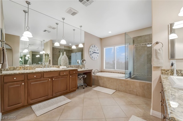 7778 Villa Montara St, Las Vegas, NV 89123 - full bath featuring tile patterned flooring, a stall shower, vanity, and a bath