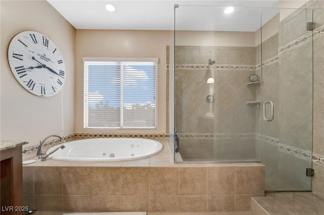 7778 Villa Montara St, Las Vegas, NV 89123 - full bathroom featuring a jetted tub, a shower stall, vanity, and recessed lighting