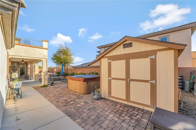 7778 Villa Montara St, Las Vegas, NV 89123 - view of shed featuring a hot tub and a fenced backyard