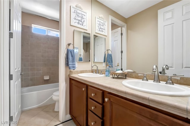 7778 Villa Montara St, Las Vegas, NV 89123 - bathroom featuring tile patterned floors, double vanity, and toilet