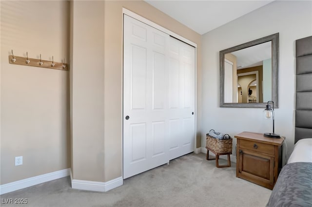 7778 Villa Montara St, Las Vegas, NV 89123 - bedroom with light colored carpet, baseboards, and a closet