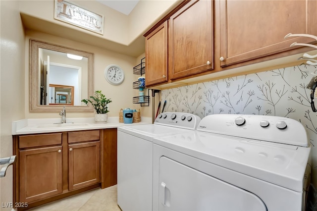 7778 Villa Montara St, Las Vegas, NV 89123 - washroom featuring cabinet space, washer and clothes dryer, and light tile patterned floors