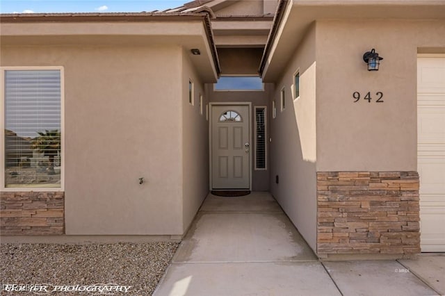 942 Shadow Hawk Rdg, Mesquite, NV 89027 - property entrance with stucco siding and stone siding