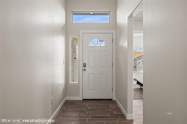 942 Shadow Hawk Rdg, Mesquite, NV 89027 - entrance foyer with baseboards, dark wood-style floors, and a high ceiling