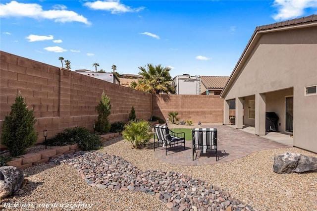 942 Shadow Hawk Rdg, Mesquite, NV 89027 - fenced backyard with a patio area