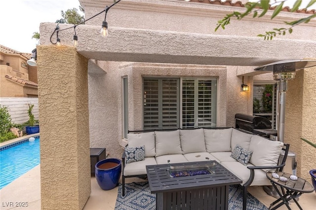 53 Grossinger Ct, Henderson, NV 89074 - view of patio / terrace with an outdoor living space with a fire pit