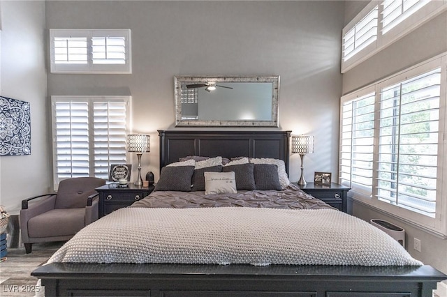 53 Grossinger Ct, Henderson, NV 89074 - bedroom with a towering ceiling and wood finished floors