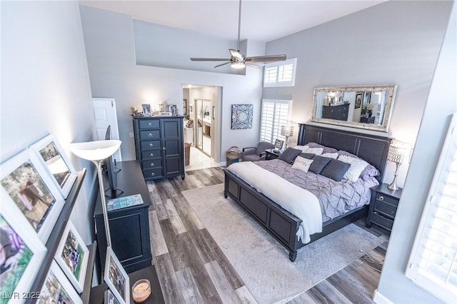 53 Grossinger Ct, Henderson, NV 89074 - bedroom with wood finished floors, a towering ceiling, ceiling fan, and ensuite bath