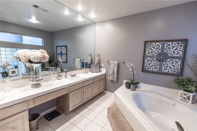 53 Grossinger Ct, Henderson, NV 89074 - full bath with a bath, double vanity, and tile patterned floors