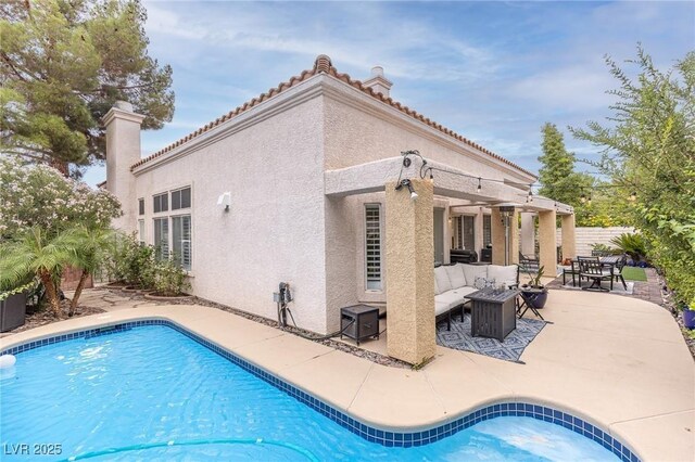 53 Grossinger Ct, Henderson, NV 89074 - outdoor pool featuring an outdoor living space and a patio area