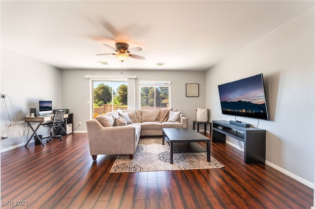 living room featuring an office area, wood finished floors, a ceiling fan, and baseboards