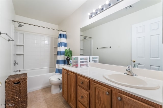 bathroom with toilet, vanity, shower / bath combo, and tile patterned floors