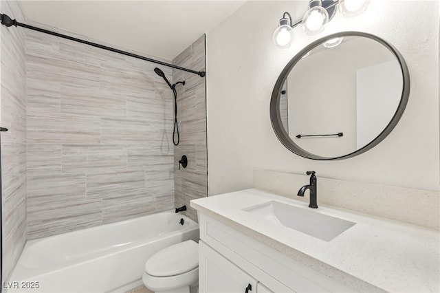 bathroom featuring toilet,  shower combination, and vanity