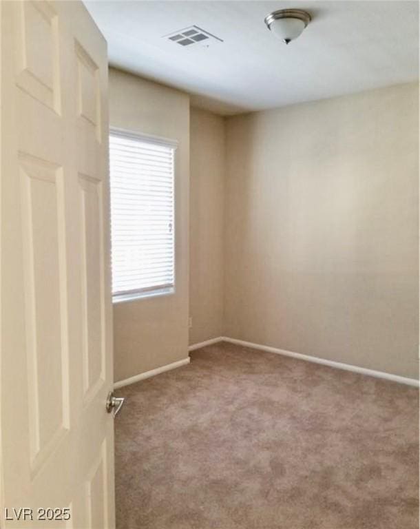 7563 Captain Lord Ct, Las Vegas, NV 89166 - unfurnished room featuring carpet floors and baseboards