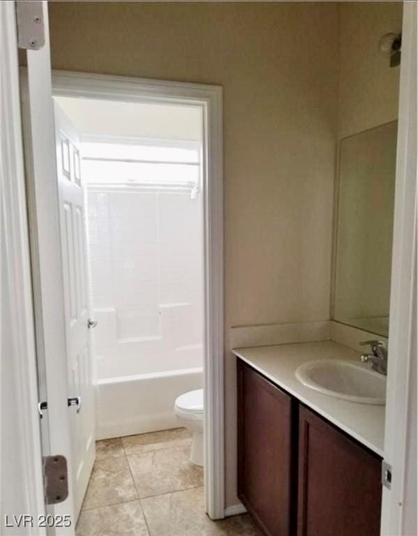 7563 Captain Lord Ct, Las Vegas, NV 89166 - full bathroom with vanity, toilet, and tile patterned flooring