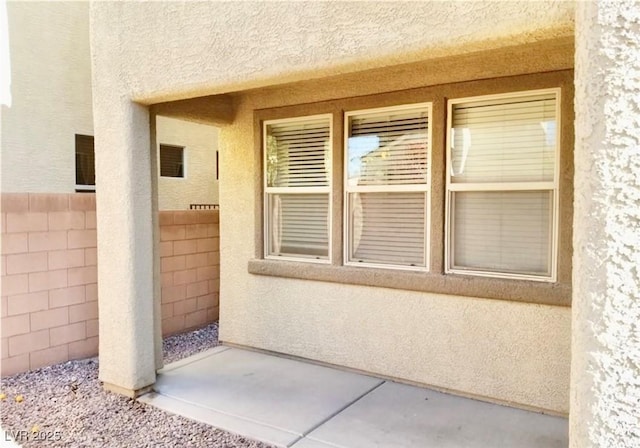 7563 Captain Lord Ct, Las Vegas, NV 89166 - entrance to property featuring stucco siding and fence