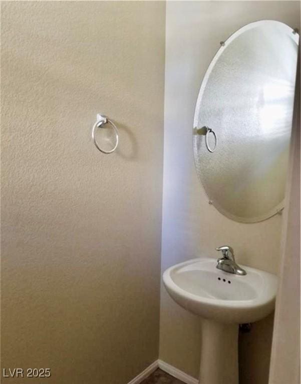 7563 Captain Lord Ct, Las Vegas, NV 89166 - bathroom with baseboards