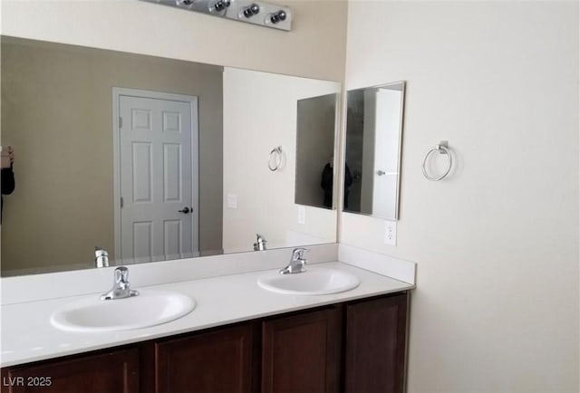 7563 Captain Lord Ct, Las Vegas, NV 89166 - bathroom featuring double vanity