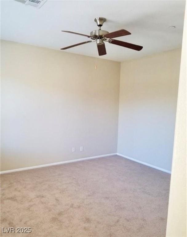 7563 Captain Lord Ct, Las Vegas, NV 89166 - unfurnished room with carpet floors, ceiling fan, and baseboards