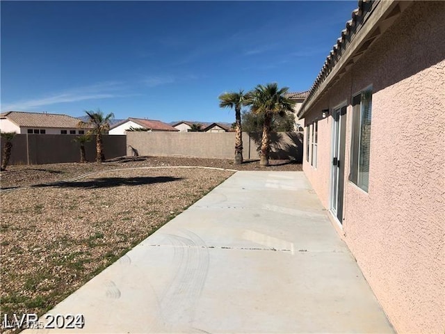1083 Sterling Peak St, Las Vegas, NV 89110 - fenced backyard featuring a patio area
