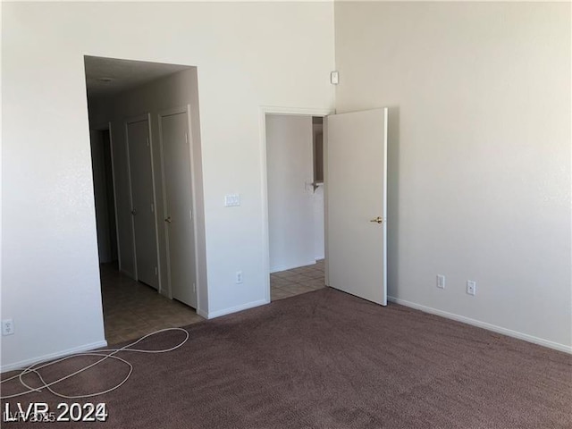 1083 Sterling Peak St, Las Vegas, NV 89110 - spare room with carpet flooring and baseboards