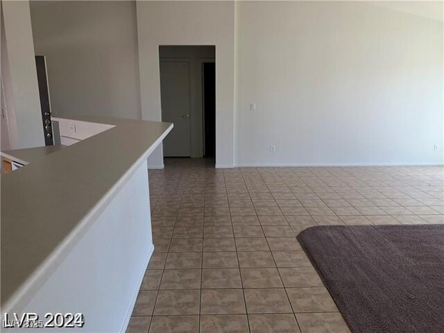 1083 Sterling Peak St, Las Vegas, NV 89110 - unfurnished room with light tile patterned flooring and baseboards