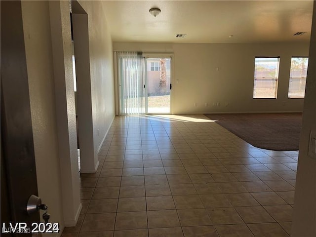 1083 Sterling Peak St, Las Vegas, NV 89110 - tiled empty room featuring baseboards