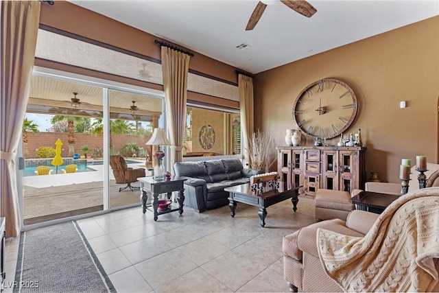 7719 Villa Montara St, Las Vegas, NV 89123 - living area with ceiling fan and light tile patterned floors