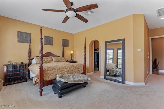7719 Villa Montara St, Las Vegas, NV 89123 - carpeted bedroom with arched walkways, baseboards, and ceiling fan