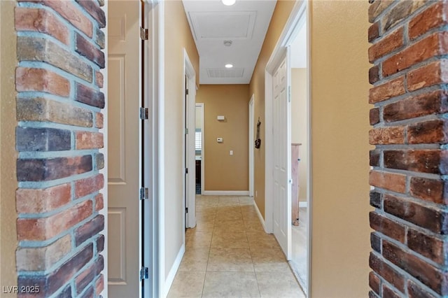 7719 Villa Montara St, Las Vegas, NV 89123 - corridor with attic access, light tile patterned flooring, and baseboards