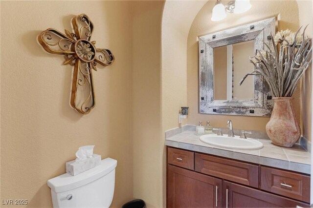 7719 Villa Montara St, Las Vegas, NV 89123 - half bathroom with toilet and vanity