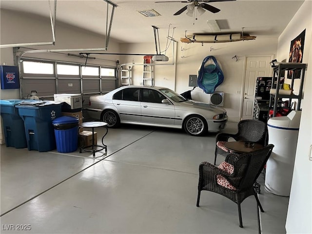 7719 Villa Montara St, Las Vegas, NV 89123 - garage featuring a garage door opener and a ceiling fan