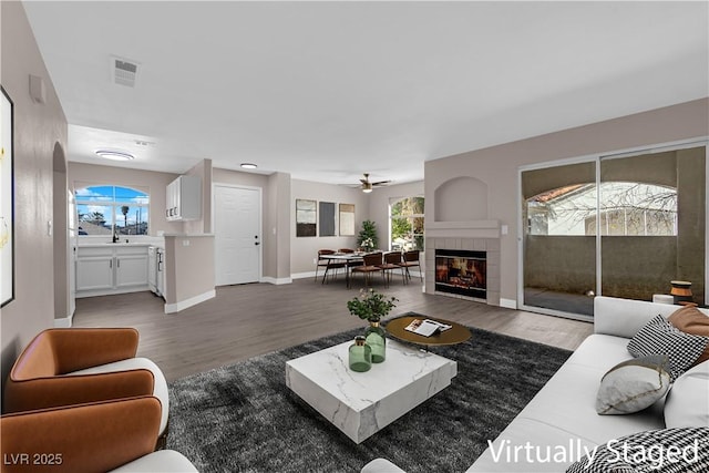 4324 W Lake Mead Blvd Unit 202, Las Vegas, NV 89108 - living room with healthy amount of natural light, wood finished floors, and ceiling fan