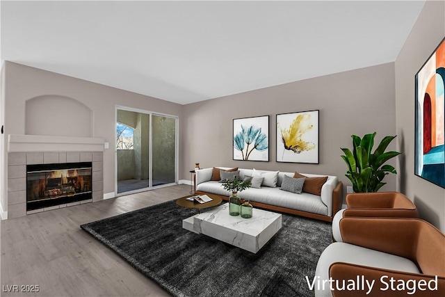 4324 W Lake Mead Blvd Unit 202, Las Vegas, NV 89108 - living room featuring wood finished floors and a fireplace