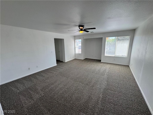 10574 Salmon Leap St, Las Vegas, NV 89183 - empty room featuring a ceiling fan, carpet floors, baseboards, and a textured ceiling