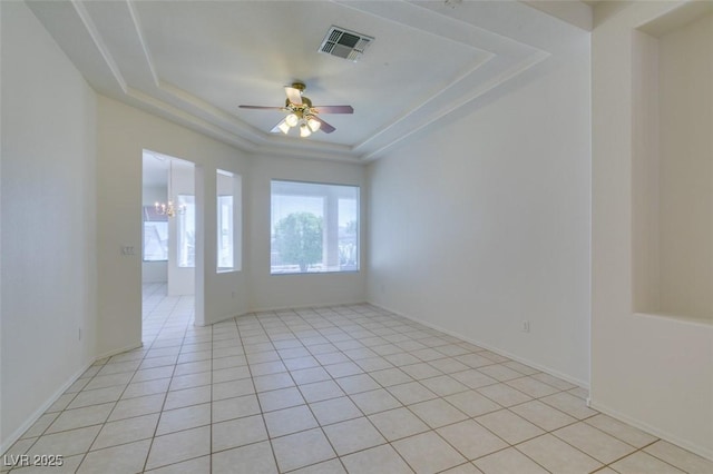 494 Dart Brook Pl, Henderson, NV 89012 - empty room featuring a tray ceiling, ceiling fan, a chandelier, and light tile patterned flooring