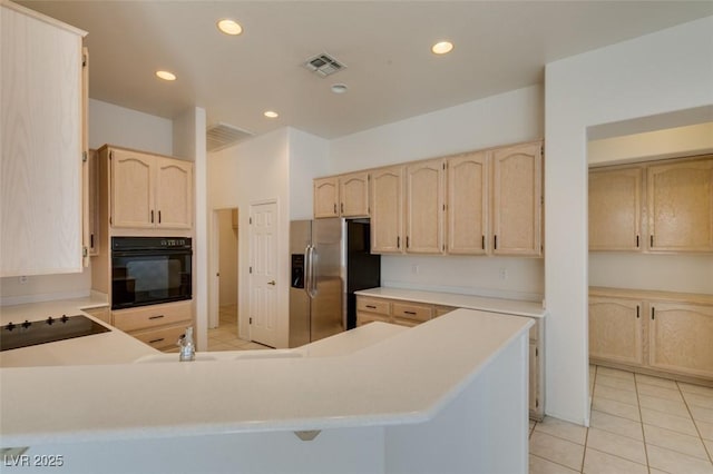 494 Dart Brook Pl, Henderson, NV 89012 - kitchen with black appliances, light brown cabinetry, light tile patterned flooring, and recessed lighting