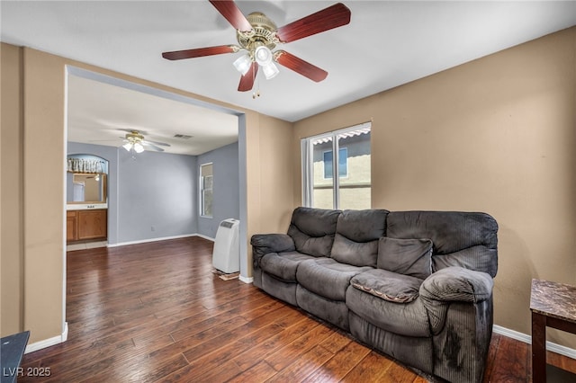 9165 Starling Wing Pl, Las Vegas, NV 89143 - living room with wood-type flooring, a ceiling fan, and baseboards