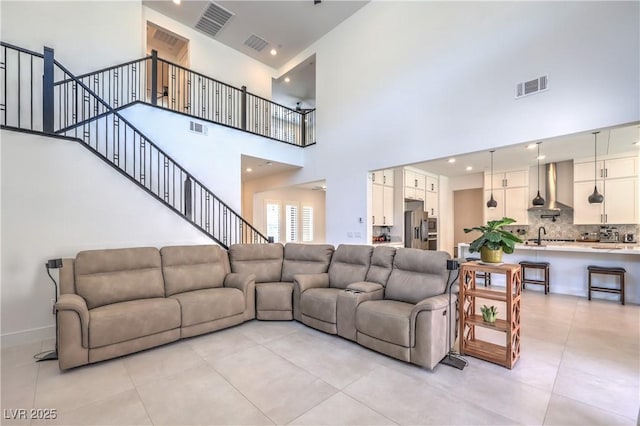 201 Carmel Sky St, Las Vegas, NV 89138 - living area featuring a towering ceiling and light tile patterned floors