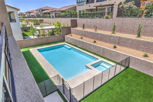 201 Carmel Sky St, Las Vegas, NV 89138 - view of pool featuring a pool with connected hot tub, a fenced backyard, and a residential view