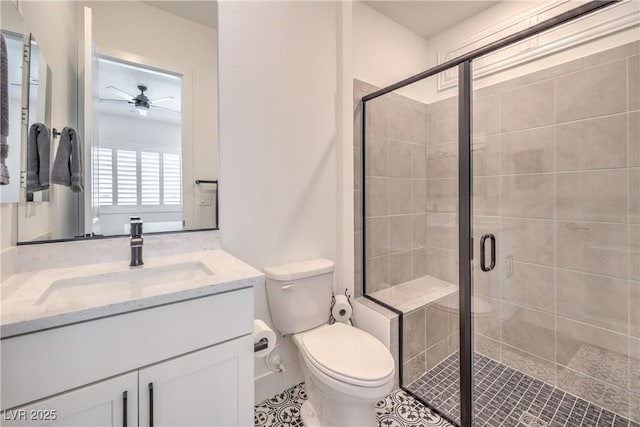 201 Carmel Sky St, Las Vegas, NV 89138 - bathroom featuring ceiling fan, vanity, a stall shower, and tile patterned floors