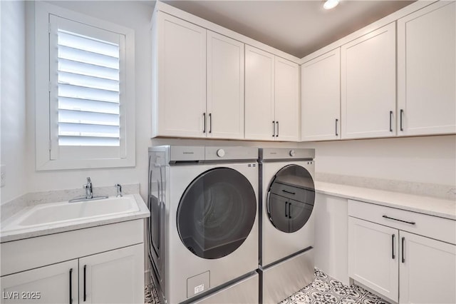 201 Carmel Sky St, Las Vegas, NV 89138 - washroom with independent washer and dryer and cabinet space
