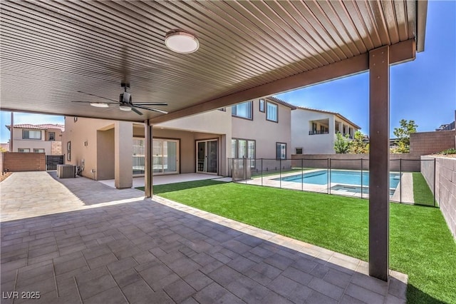 201 Carmel Sky St, Las Vegas, NV 89138 - fenced backyard with a ceiling fan, a patio, and a pool with connected hot tub