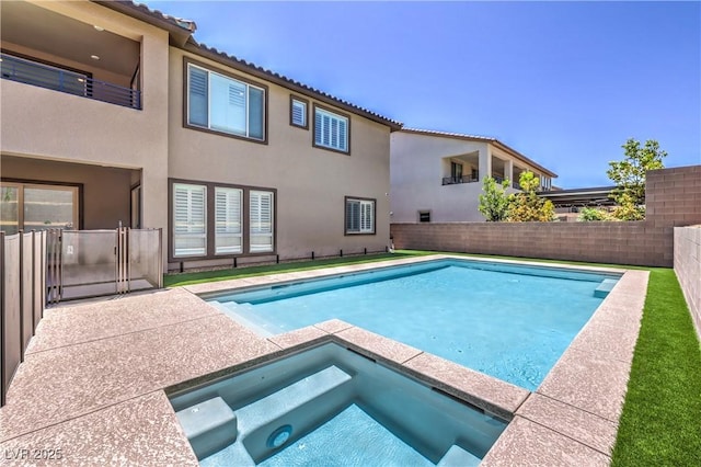 201 Carmel Sky St, Las Vegas, NV 89138 - view of swimming pool with an in-ground hot tub and a fenced backyard