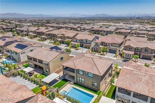 201 Carmel Sky St, Las Vegas, NV 89138 - aerial perspective of suburban area featuring a pool and mountains